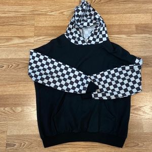 Black hoodie with checkered hood and sleeves